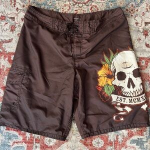 Y2K Mens Large Dark Brown MCM Metal Skull Graphic Print Long Board Swim Shorts